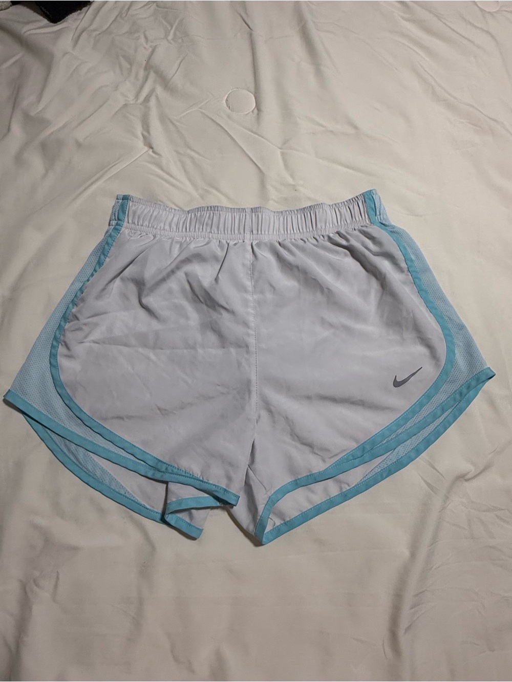Nike Women’s White Athletic Shorts with Light Blue Trim